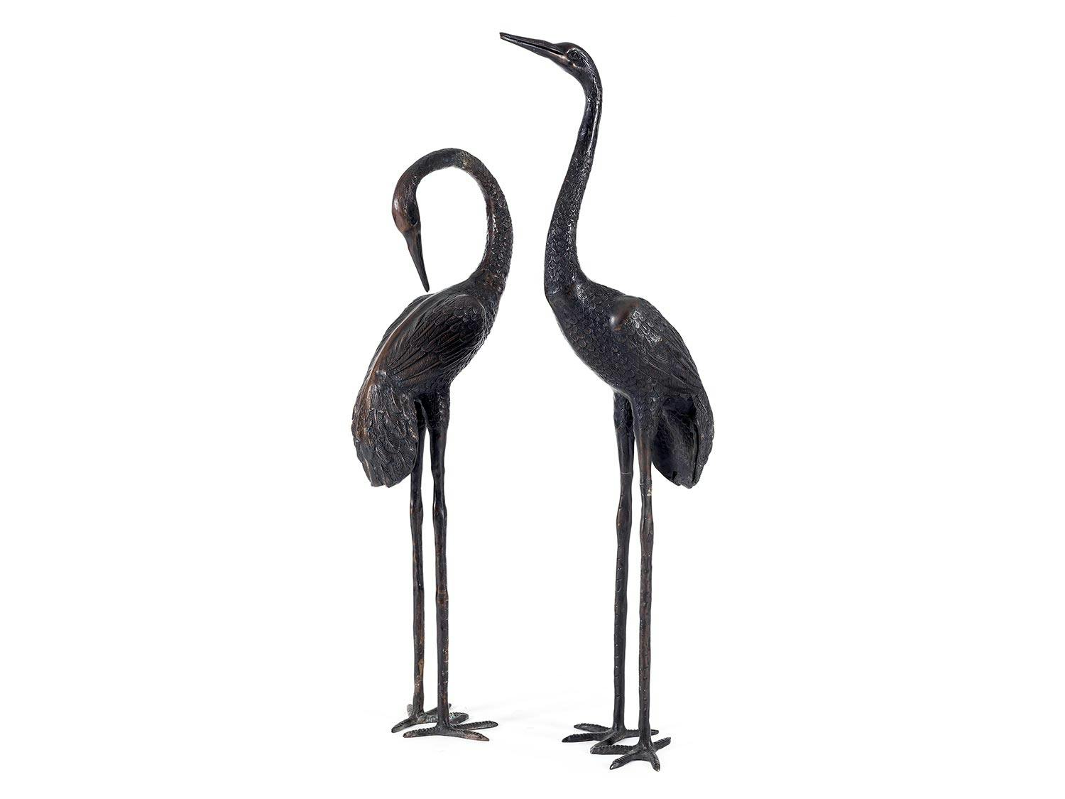Paar Kranichfiguren