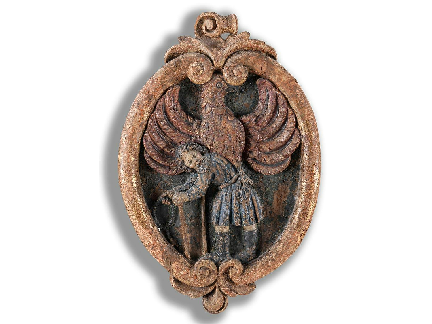 Detailabbildung: Zwei geschnitzte Wappen